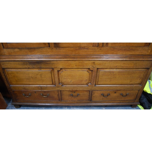 375 - George III oak cabinet on dower chest (formerly a livery cupboard), the glazed door enclosing velour... 