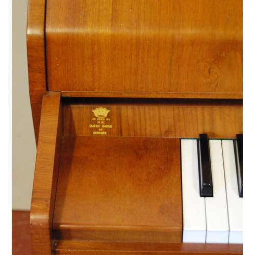 377 - Eavestaff Pianette walnut-cased minipiano, 'As Used by HM Queen Ingrid of Denmark', made in England ... 