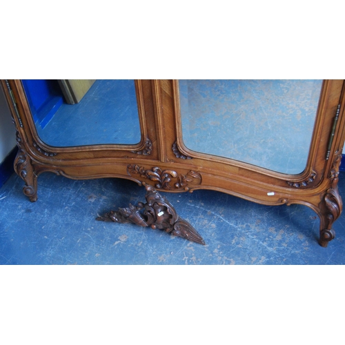 370 - French walnut armoire, with a detachable surmount above a shaped cornice decorated with floral round... 