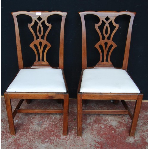 379 - Pair of George III mahogany dining chairs in the manner of Thomas Chippendale, each with pierced spl... 