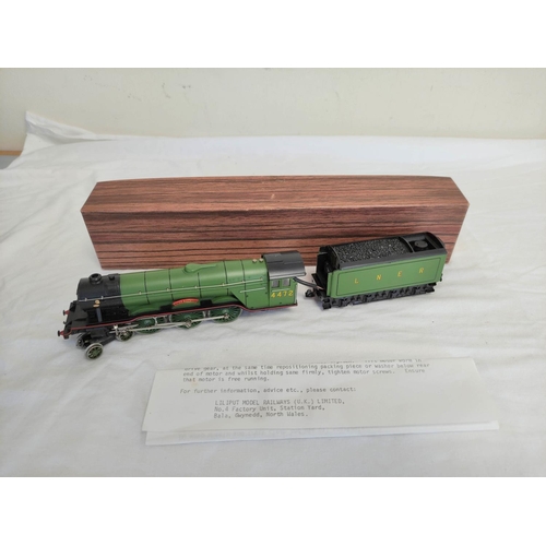 67 - Liliput / Trix Trains. Two boxed 00 gauge model trains comprising of an A3 class 4-6-2 