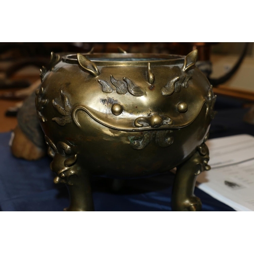 355 - Large Chinese brass censer on triple ball and claw supports with lion mask surmounts, the body decor... 