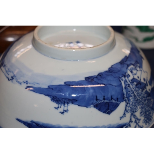 371 - Late 19th century blue and white bowl decorated with landscape scenes to the exterior and interior.