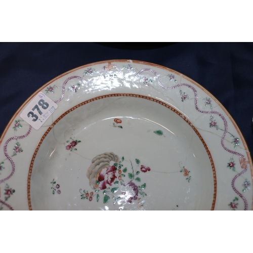 378 - Four 18th century Chinese porcelain dishes, a pair decorated in famille rose colours with wavy folia... 