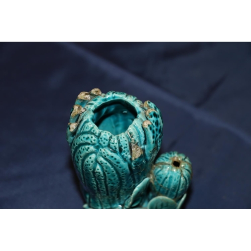 352 - A 19th century blue glazed brush washer in the form of a finger citron, 11cm, and a small cinnabar l... 