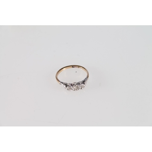 486 - 9ct gold platinum and diamond three stone ring, size M, 1.7g.