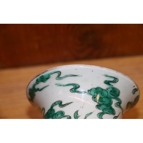 368 - 19th century Chinese column vase decorated in green enamel with an encircling dragon amongst clouds,... 