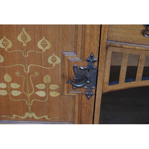 380 - Arts & Crafts inlaid oak sideboard in the Glasgow School taste, the top section with a shaped pe... 