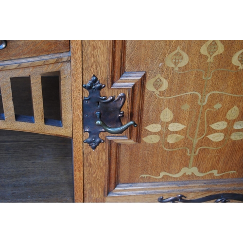 380 - Arts & Crafts inlaid oak sideboard in the Glasgow School taste, the top section with a shaped pe... 