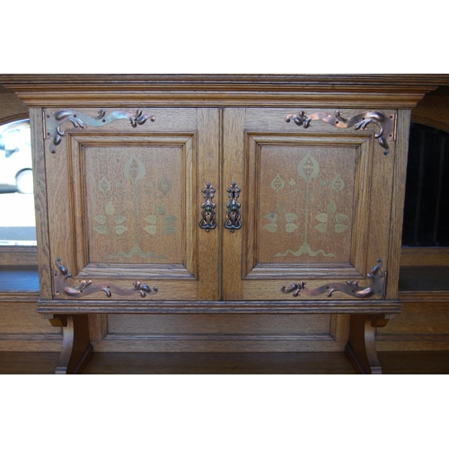 380 - Arts & Crafts inlaid oak sideboard in the Glasgow School taste, the top section with a shaped pe... 