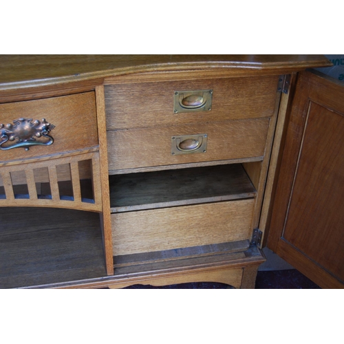 380 - Arts & Crafts inlaid oak sideboard in the Glasgow School taste, the top section with a shaped pe... 