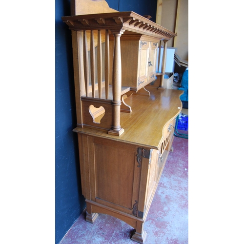 380 - Arts & Crafts inlaid oak sideboard in the Glasgow School taste, the top section with a shaped pe... 