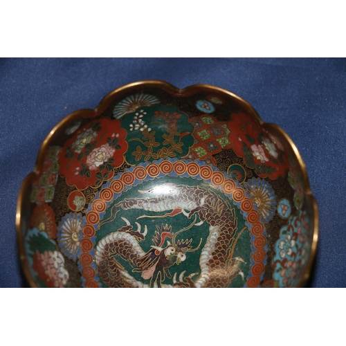 392 - A Japanese cloisonne bowl with petal edge and gilt metal wires, decorated with various shaped panels... 