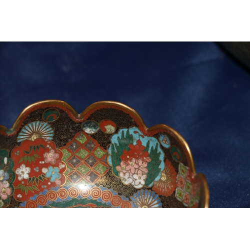 392 - A Japanese cloisonne bowl with petal edge and gilt metal wires, decorated with various shaped panels... 