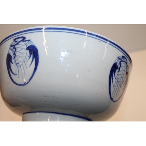 68 - Antique blue & white bowl, possibly Chinese, 18cm diameter.