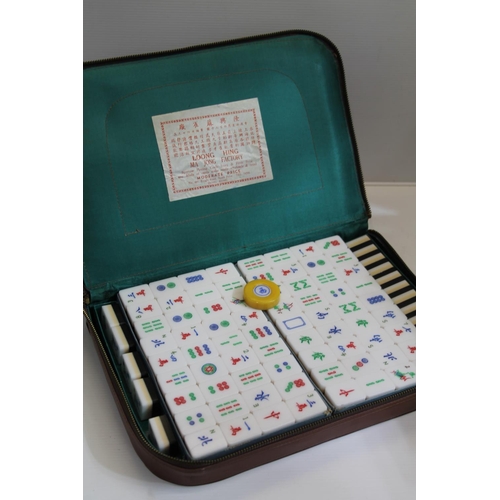 52C - Vintage Loong Hing Mahjong set in fitted case.