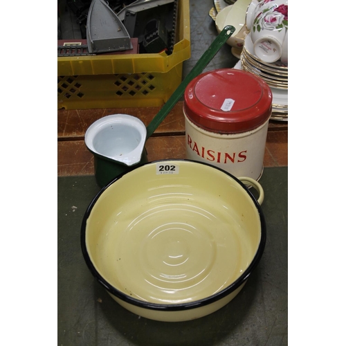 202 - Enamelled pouring vessel, a bowl, and a raisin storage jar.