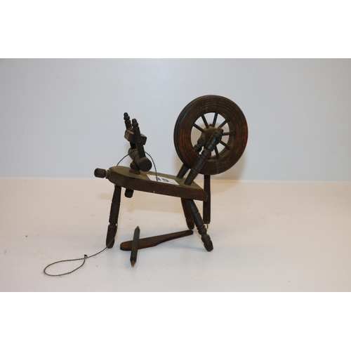 15 - Miniature model of a spinning wheel, 16cm tall.