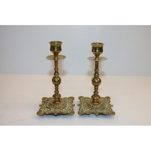 26 - Pair of dwarf brass candlesticks 16cm tall. 