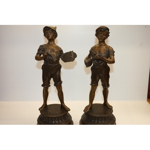 31 - Pair of German cast metal statues, Music and Painting, 38cm tall.