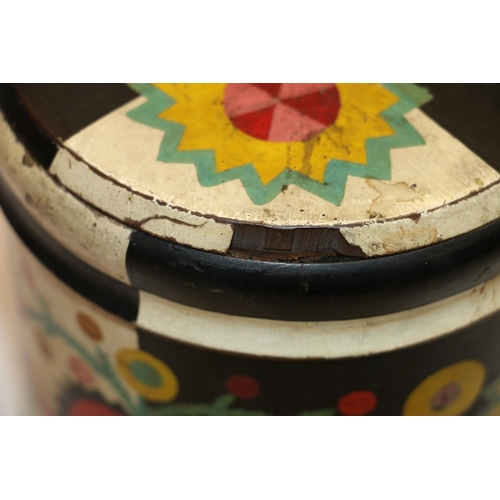 41 - Painted wooden storage jar with barge ware style decoration, perhaps Scandinavian, 16cm tall.