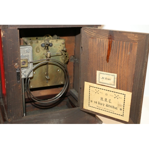 42 - German mantle clock with movement striking on a gong, label to the reverse of the door 'HAC 14 Day S... 