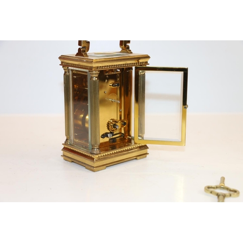 43 - Mappin & Webb Ltd brass carriage clock, 15cm tall.