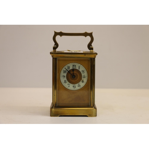 46 - French brass carriage clock, 14cm tall.