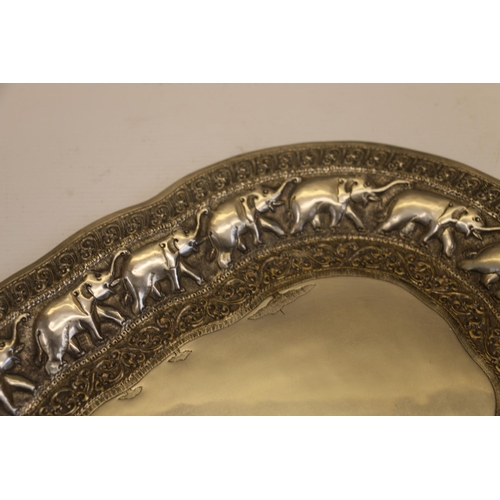 50 - Indian silver coloured metal (probably low grade silver) tray in the form of a lake with procession ... 