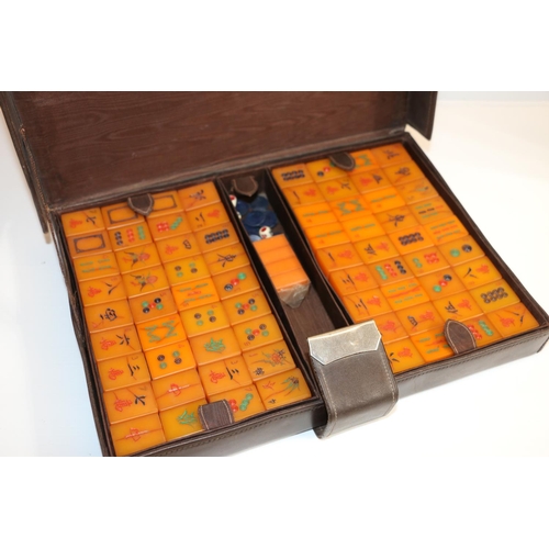 52B - Vintage Mahjong set in fitted leather case.