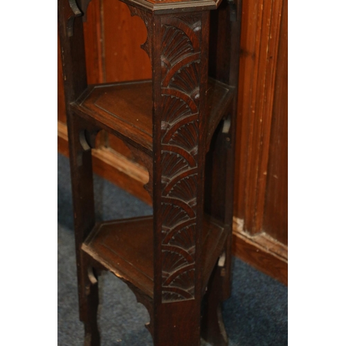 696 - Scottish Arts and Crafts style carved oak three tier whatnot jardiniere stand, 106cm.