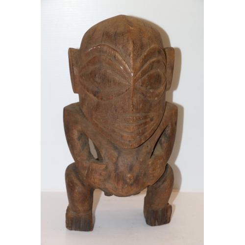 9 - Unusual carved wood fertility type figure, possibly Maori, 37cm tall.  