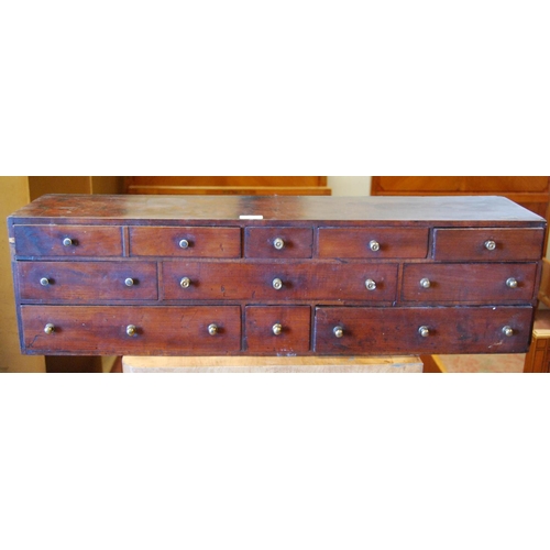 383 - Set of George III mahogany collector's drawers with eleven assorted deep drawers, 25cm high, 92cm wi... 