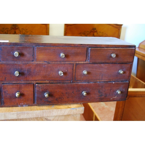 383 - Set of George III mahogany collector's drawers with eleven assorted deep drawers, 25cm high, 92cm wi... 