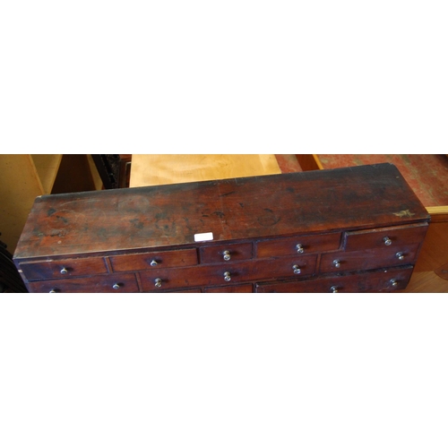 383 - Set of George III mahogany collector's drawers with eleven assorted deep drawers, 25cm high, 92cm wi... 