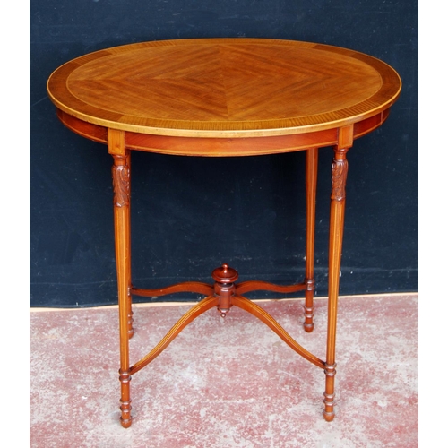 388 - Edwardian inlaid mahogany occasional table, the oval top inlaid with satinwood stringing, on four tu... 