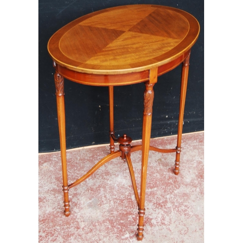 388 - Edwardian inlaid mahogany occasional table, the oval top inlaid with satinwood stringing, on four tu... 