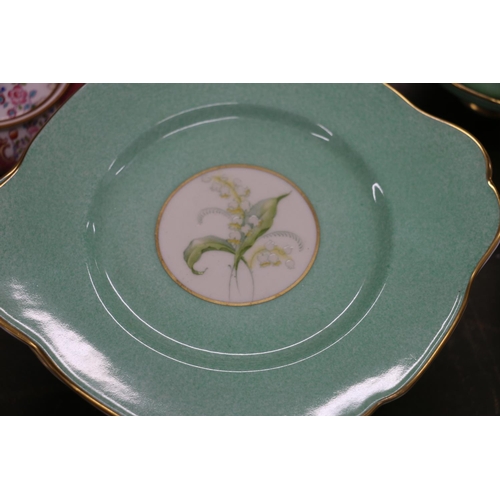 215 - Paragon fine china green ground floral decorated teaset.