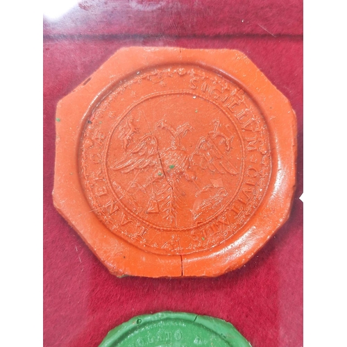 193 - Fifteen framed 18th & 19th century wax postage seals to include a city seal (possibly Prussian) ... 