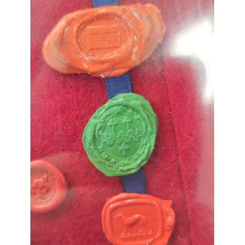 193 - Fifteen framed 18th & 19th century wax postage seals to include a city seal (possibly Prussian) ... 