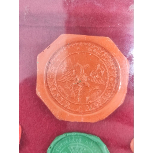193 - Fifteen framed 18th & 19th century wax postage seals to include a city seal (possibly Prussian) ... 