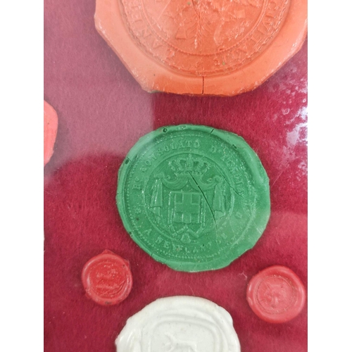 193 - Fifteen framed 18th & 19th century wax postage seals to include a city seal (possibly Prussian) ... 