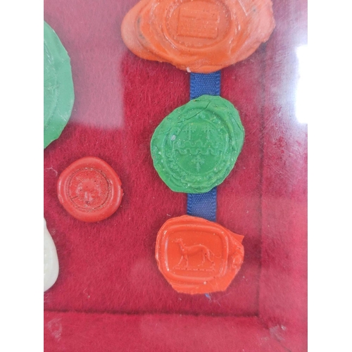 193 - Fifteen framed 18th & 19th century wax postage seals to include a city seal (possibly Prussian) ... 