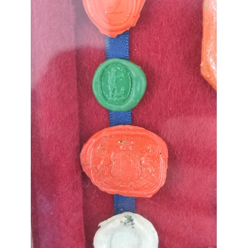193 - Fifteen framed 18th & 19th century wax postage seals to include a city seal (possibly Prussian) ... 
