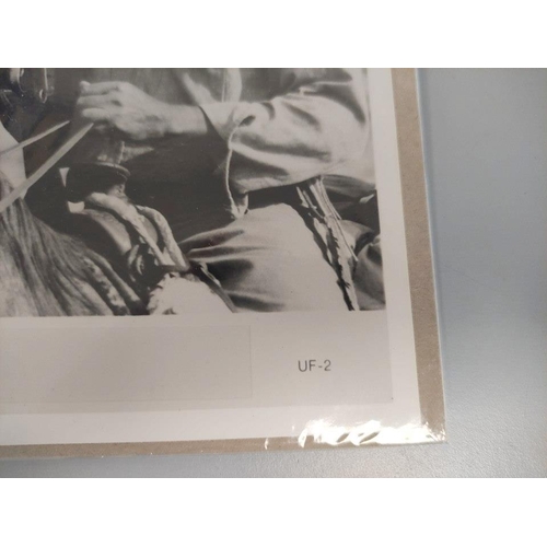 234 - Clint Eastwood-signed film still from the movie Unforgiven 1992.