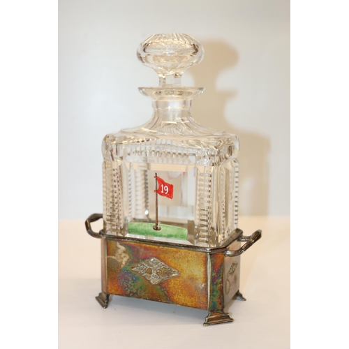 260 - C G & Co silver-plated and cut-glass golfing decanter 'The 19th Hole', 25cm tall.