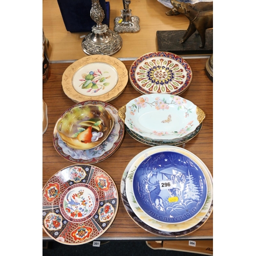 296 - Plates and dishes to include Royal Copenhagen, E Rolland hand-painted dish, etc.