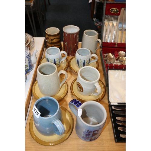 313 - Ceramics to include Buchan ware, a German mug, etc.