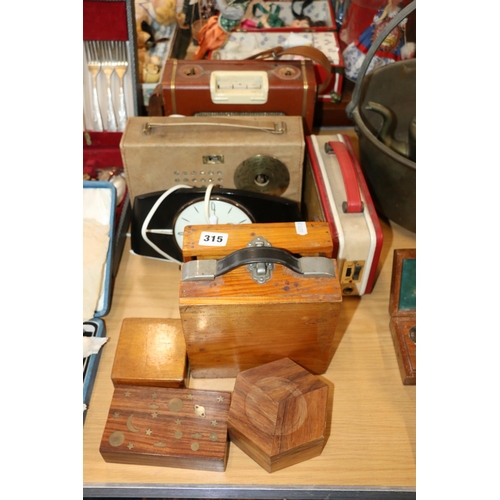 315 - Baird radio, and others, a Metamec clock, wood boxes, etc.