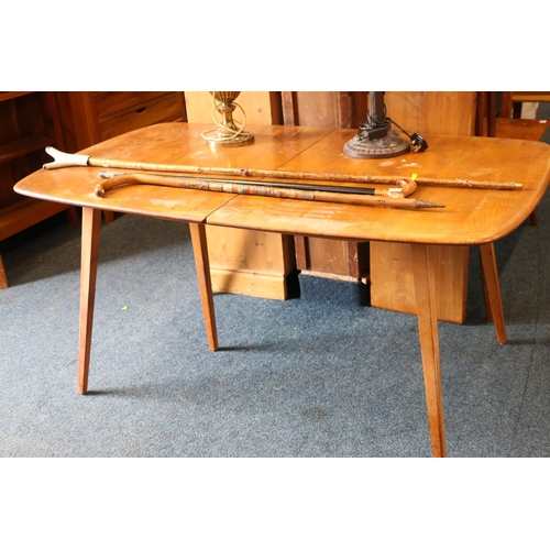 756 - Ercol style oak dining table, with two additional leaves.